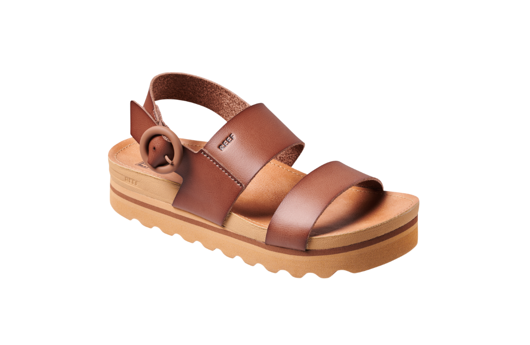 Brown sandal with a platform sole on a white background