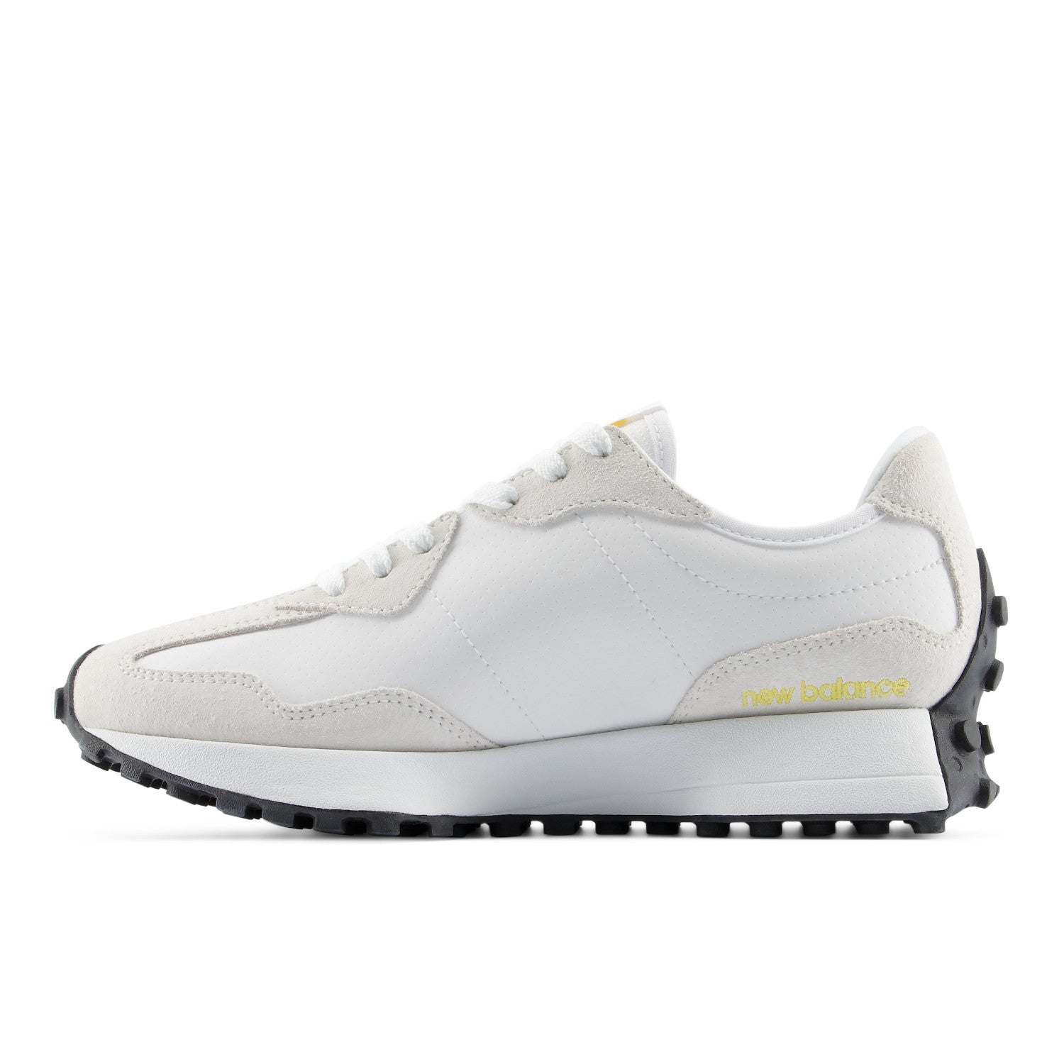 White sneaker with black sole on a white background