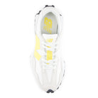 White sneaker with yellow accents on a white background
