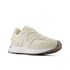Beige sneaker with white sole on a white background