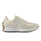 Beige sneaker with white sole on a white background