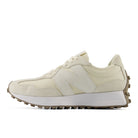 Beige sneaker with white sole on a white background