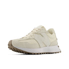 Beige sneaker with a white sole on a white background