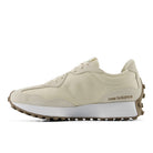 Beige sneaker with white sole on a white background