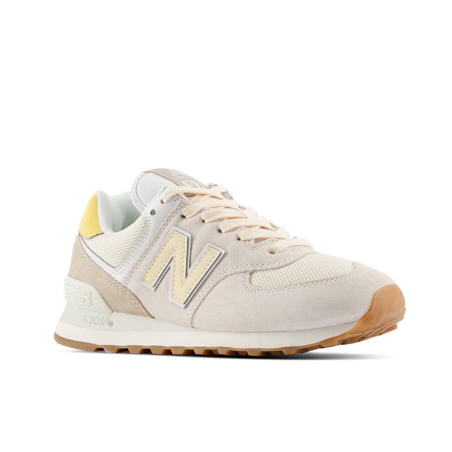 Beige sneaker with brown sole on a white background