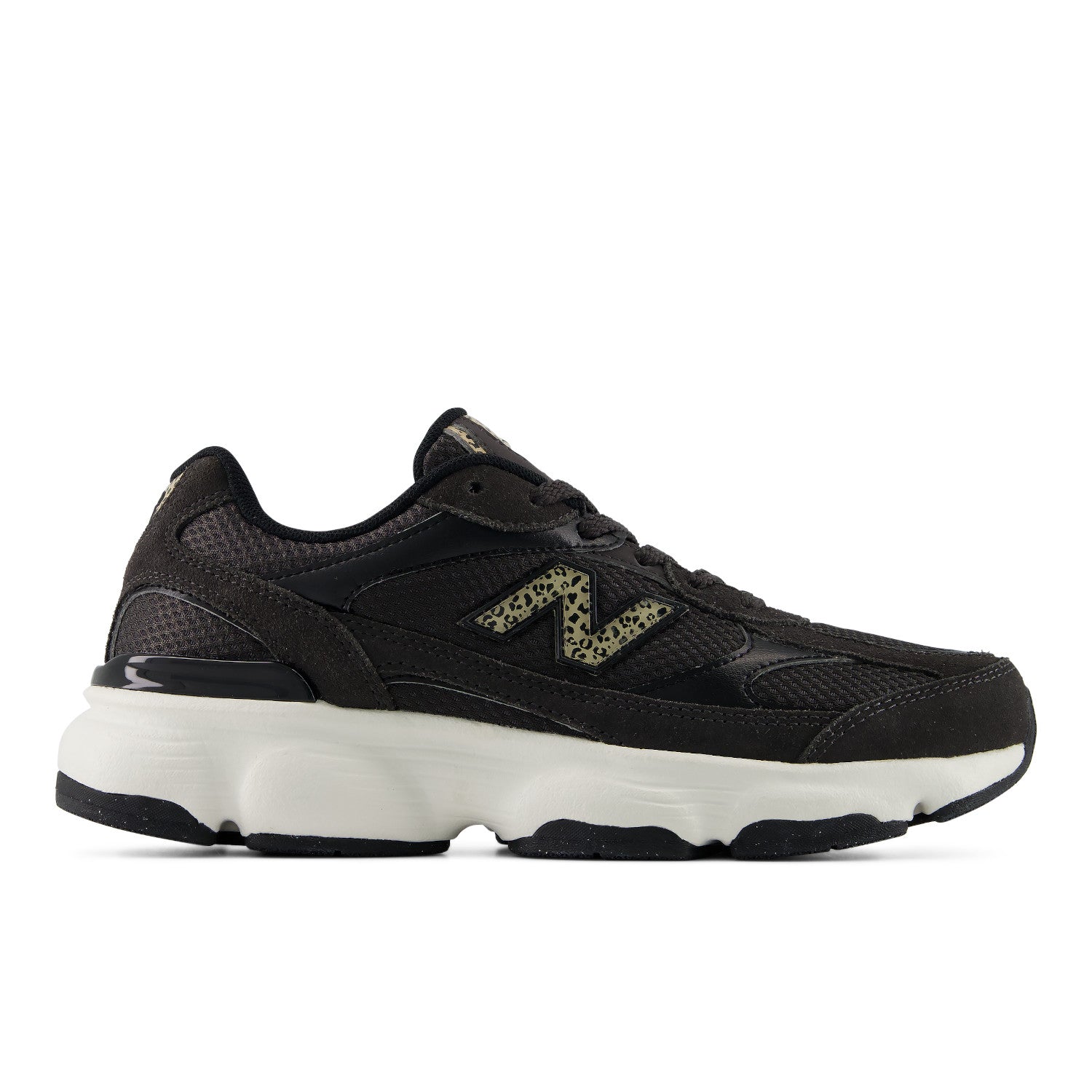 Black athletic shoe with white sole on a light gray background