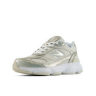 Beige sneaker with white sole on a white background