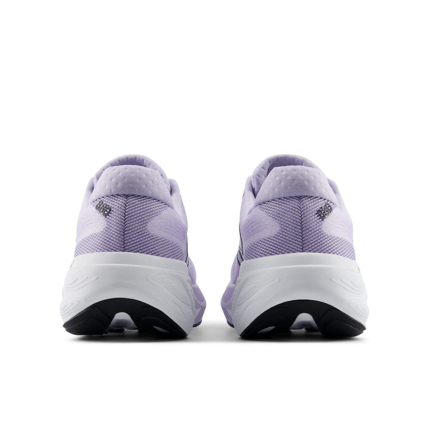 Pair of purple athletic shoes on a white background