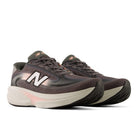 Pair of New Balance running shoes on a white background