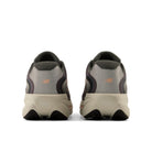 Pair of New Balance shoes shown from the back on a white background